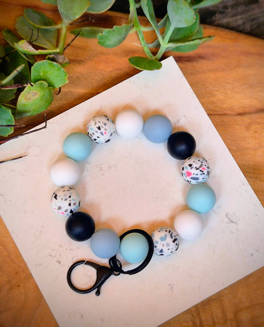 Wristlet silicone beads. Black n Teal Terrazzo