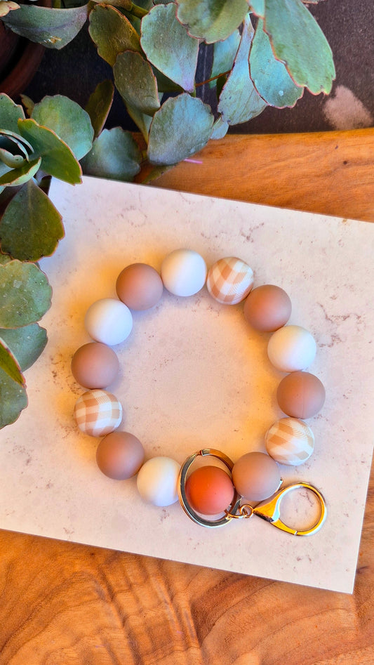 Wristlet silicone beads. Beige gingham