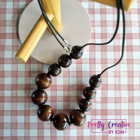 Necklace- wooden beads on Greek Leather with clasp