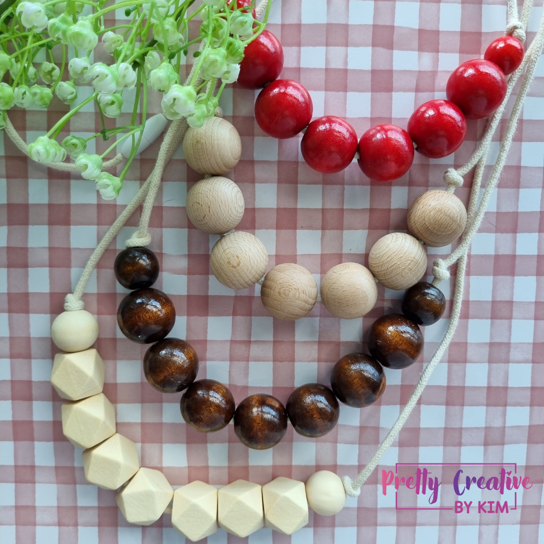 Necklaces- wood beads on cotton rope.